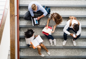 teenage students on stairs in high school PCE32JX 1